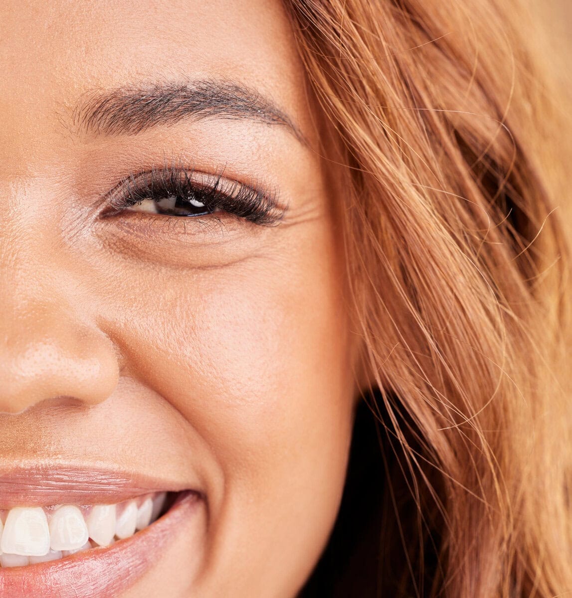 Frisse huid en stralende lach na huidverbetering bij Glow Clinic.